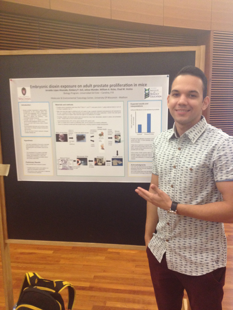 student presenting poster